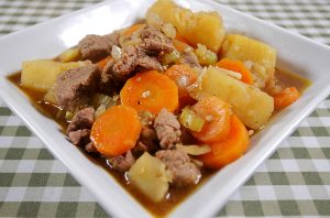 pressure cooker beef stew on a square plate