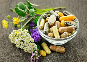 small bowl of supplements with essential nutrients