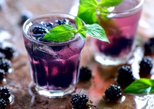 two glasses of blackberry infused water