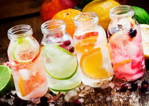 four fruit infused water recipes in jars