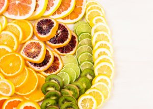 sliced citrus fruits such as oranges, kiwis, lemons that are rich in vitamin c
