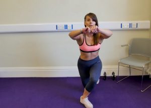 woman doing crossover lunge butt exercises