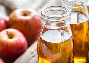 two bottles of apple cider vinegar