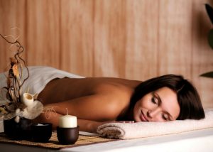 a woman relaxing at a spa