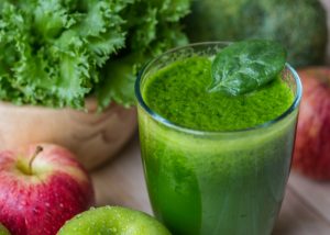 a green smoothie in a glass