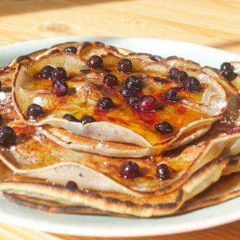 Cassava flour pancakes topped with blueberries