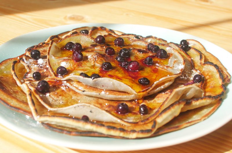 Cassava flour pancakes topped with blueberries