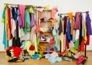 a very cluttered and messy wardrobe