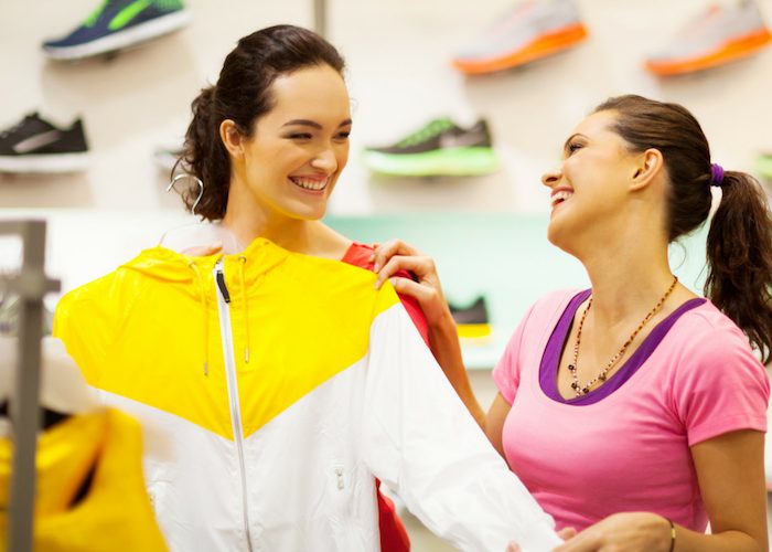 two females shopping for sportswear for women