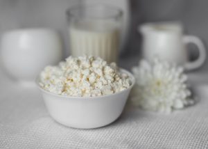Probiotic-rich homemade cottage cheese in a white bowl
