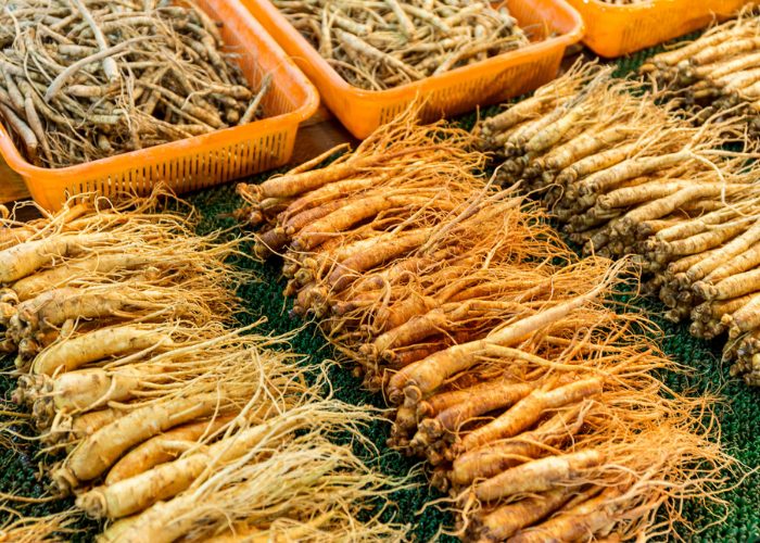 different types of ginseng laid out in a market
