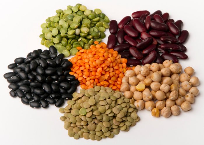 five different types of legumes on a table
