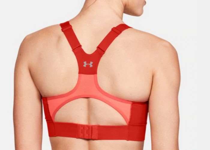 Woman wearing red high-impactUnder Armour UA Breathelux High sports bra
