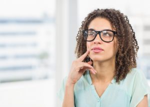 Woman sitting at her house recalling a recent memory