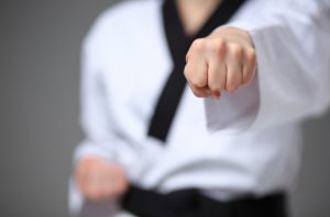 Close up of a karate black belt woman's fist