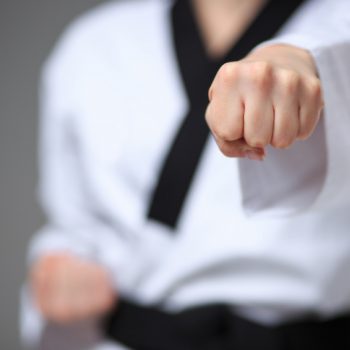 Close up of a karate black belt woman's fist