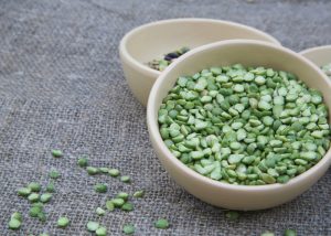 Green lentils in a ceramic bowl