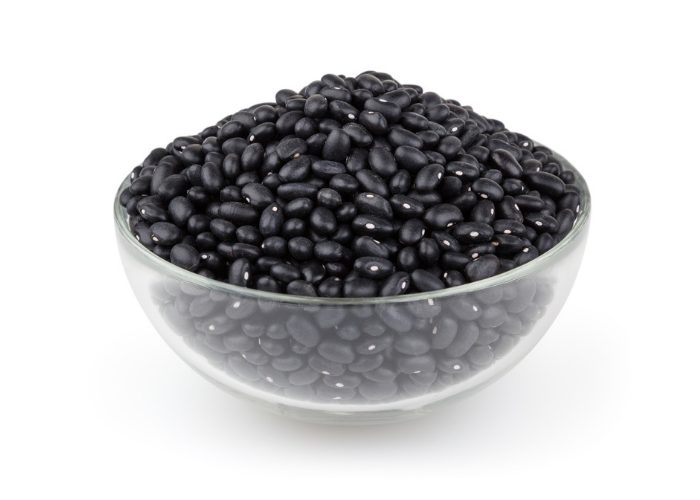 Black beans in a clear glass bowl