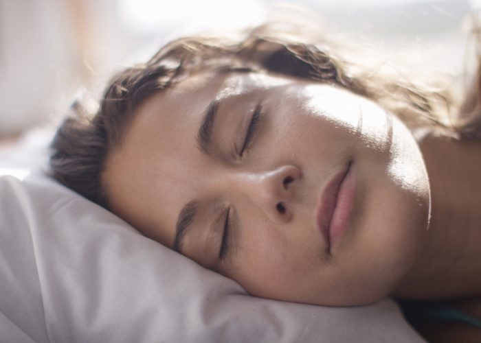 Close up of a sleeping woman's face