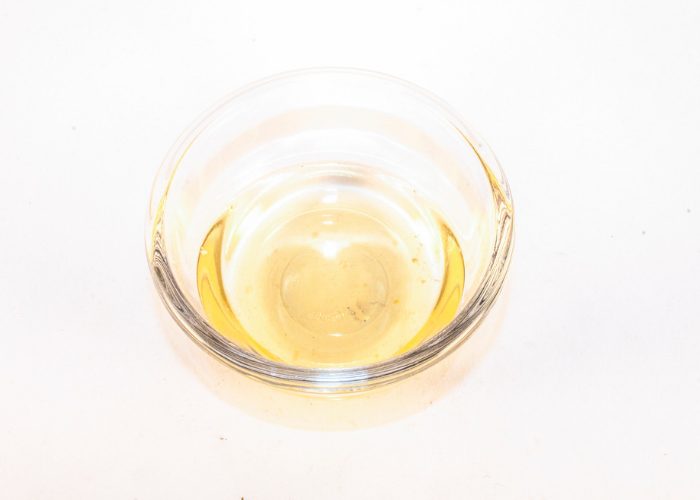 Small clear dish with white vinegar