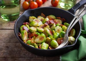 A pan of stir fried Brussels sprouts