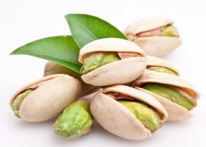 A pile of fresh pistachio nuts