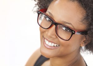 African american woman with glasses smiling
