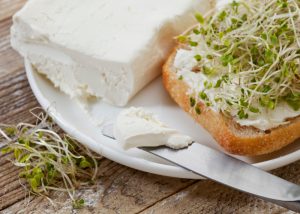 Broccoli sprouts on cheese on toast