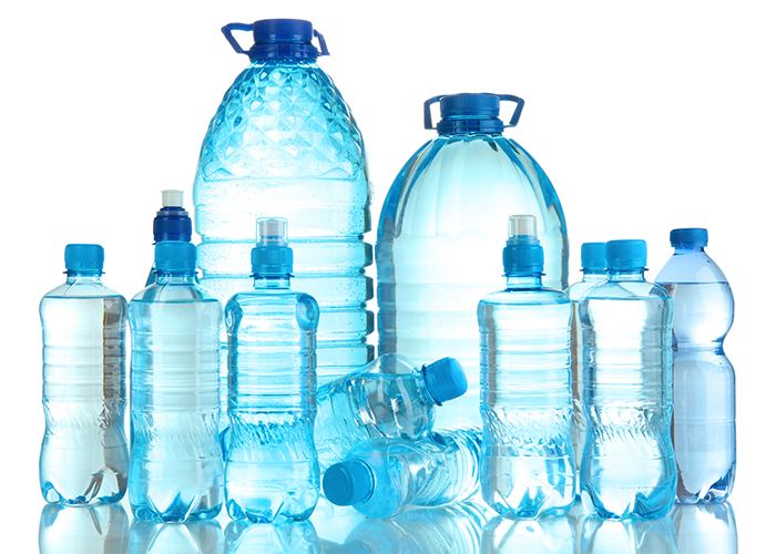 Different sized bottles of distilled vs purified water