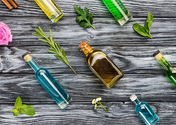 Different essential oil bottles and ingredients