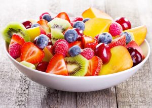 A big bowl of colorful fruit salad