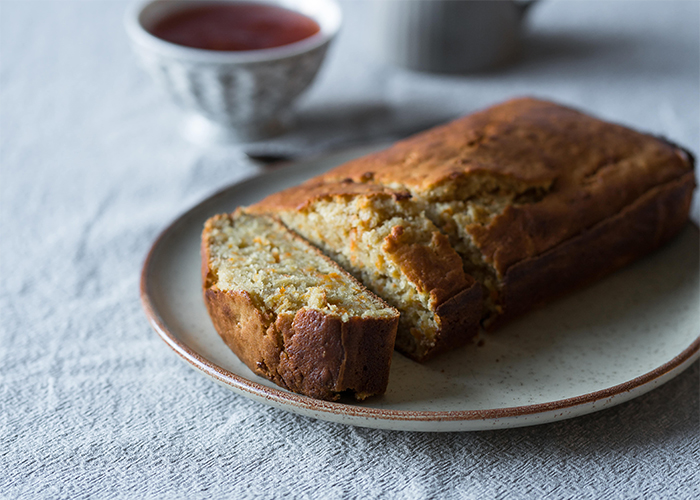 Freshly baked sugar-free keto carrot cake presented on a plate