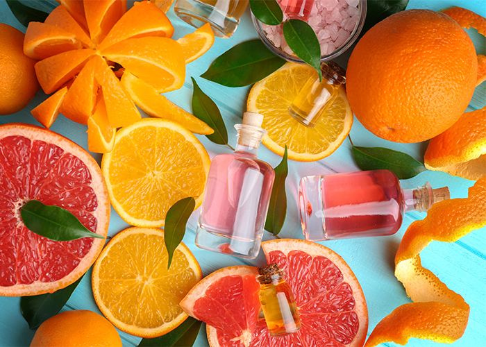 Bottle of Uplifting essential oil blend with orange, grapefruit, and frankincense oils.
