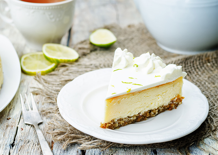 Slice of Zesty Lime Keto Cheesecake recipe served on a plate