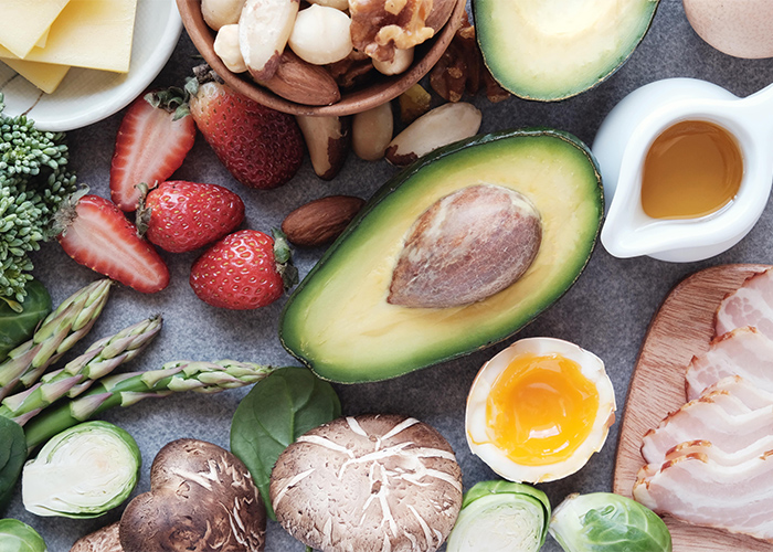 Typical ingredients on a Keto diet including, fruits, vegetables, meat, and nuts