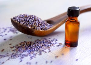 dried-lavender-with-a-bottle-of-essential-oil-on-a-rustic-table